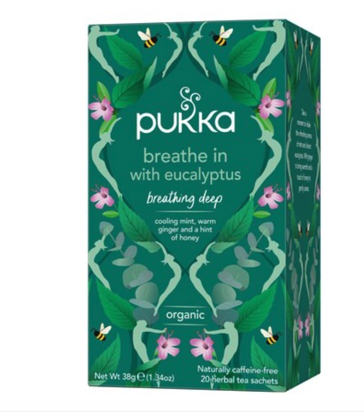 Pukka Breathe In er en økologisk te med frigjørende og lindrende ingredienser av mynte, eukalyptus, ingefær og honning.
